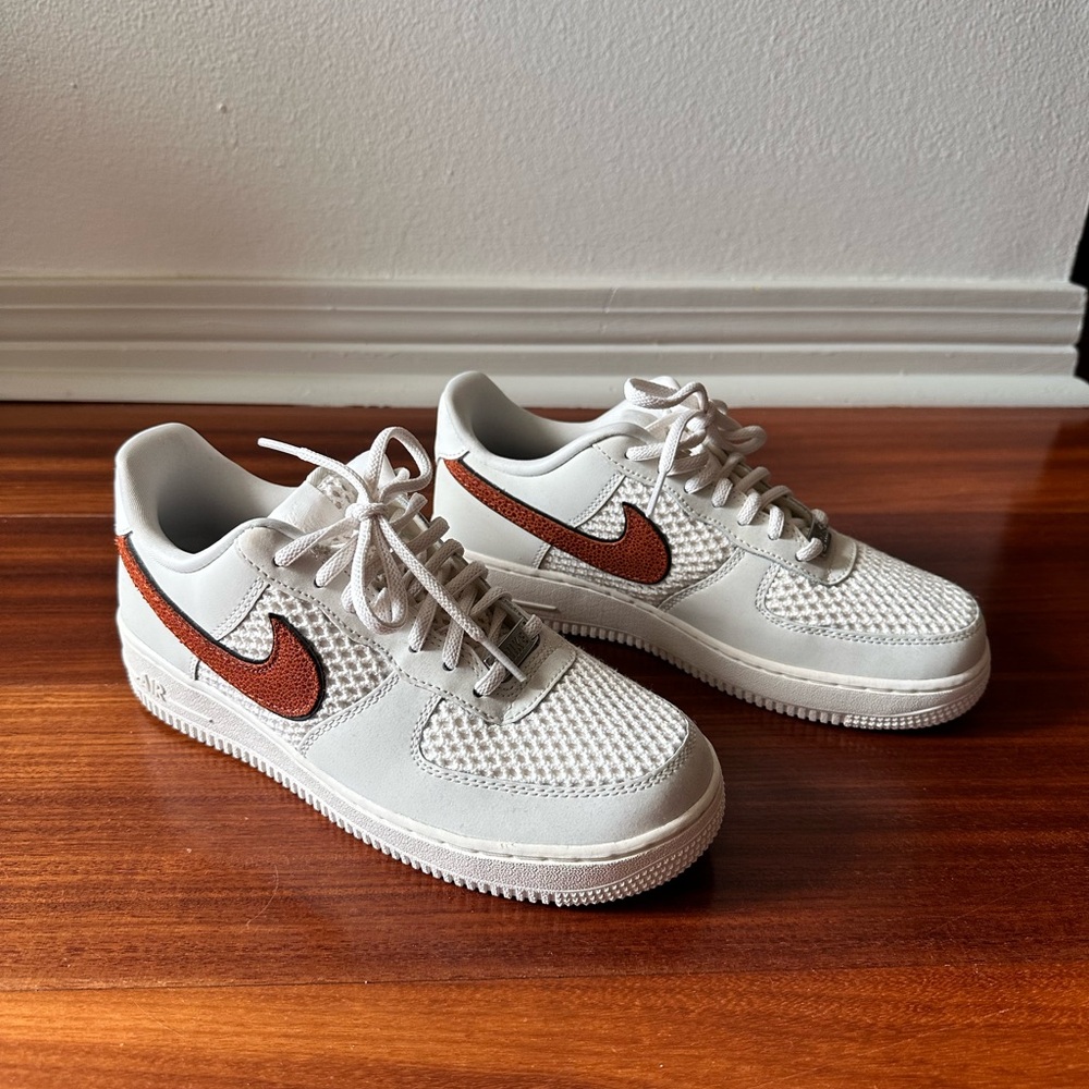Nike White Sneakers with basketball texture  Swoosh